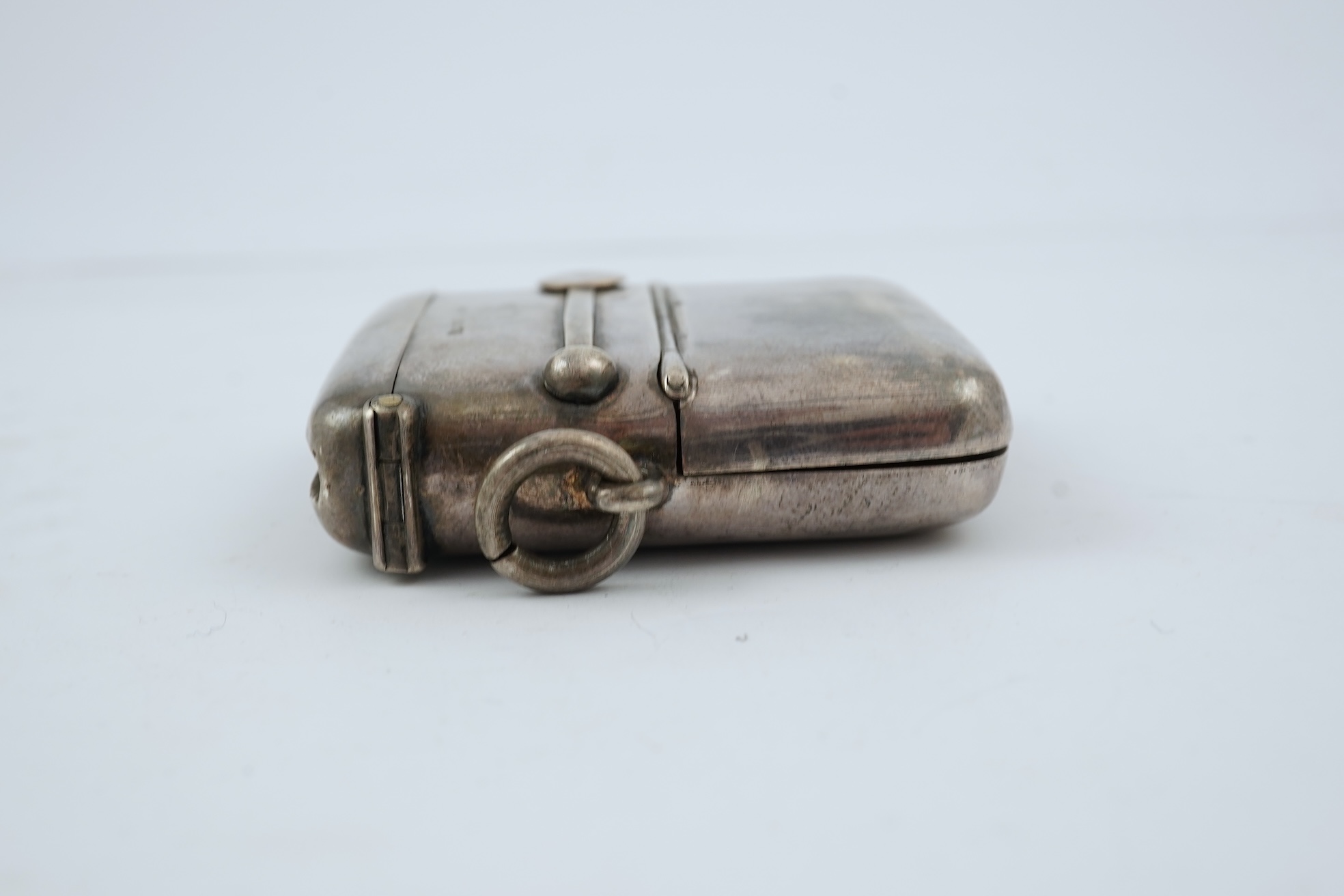 A late Victorian silver combination, cigar cutter, sovereign/half sovereign and vesta case by William Hair Haseler
